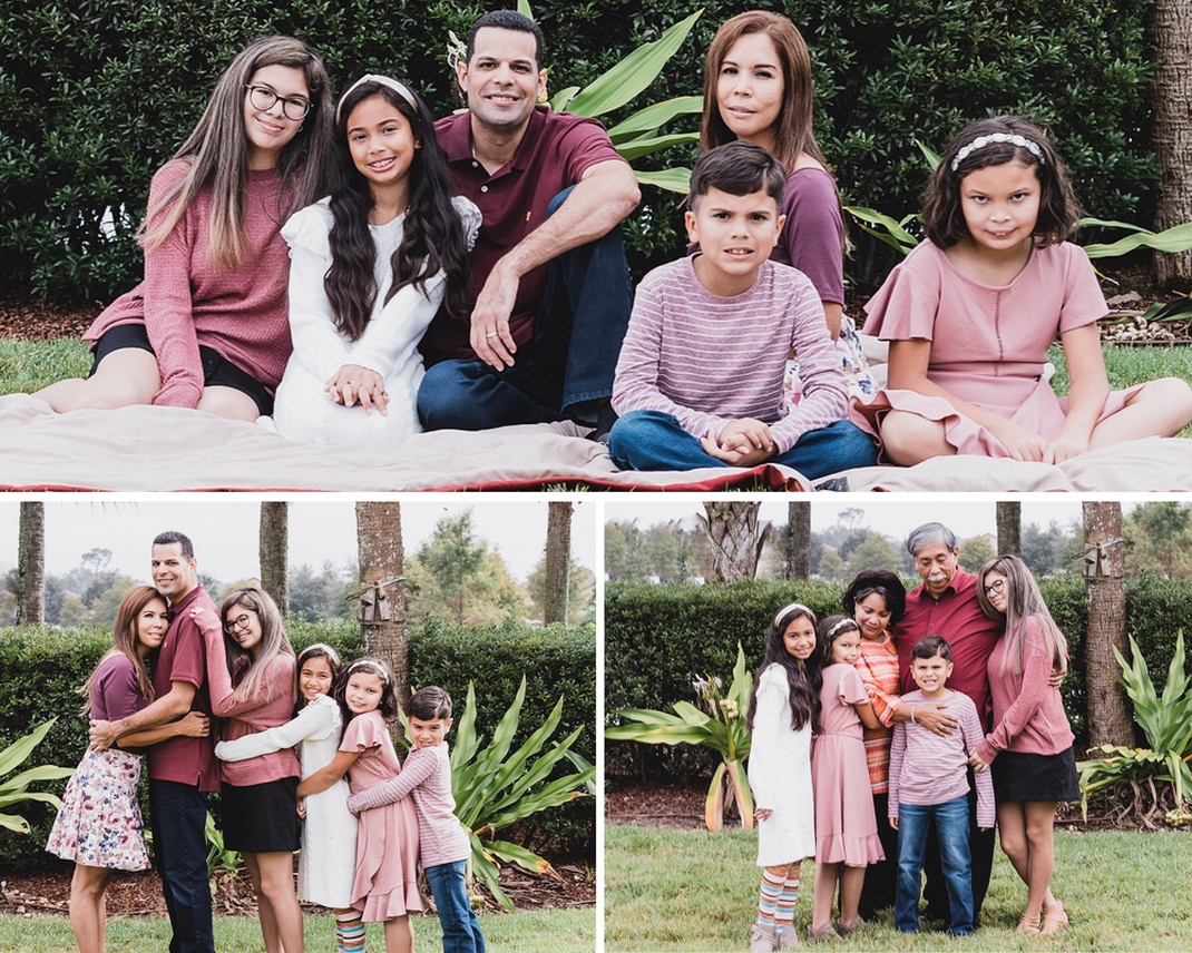 Outdoors-lifestyle-family-photo-session-family-sitting-on-blanket-on-children-standing-in-line-hugging-each-other-grandchildren-hugging-grandparents-outside-Lakewood-Ranch-Florida
