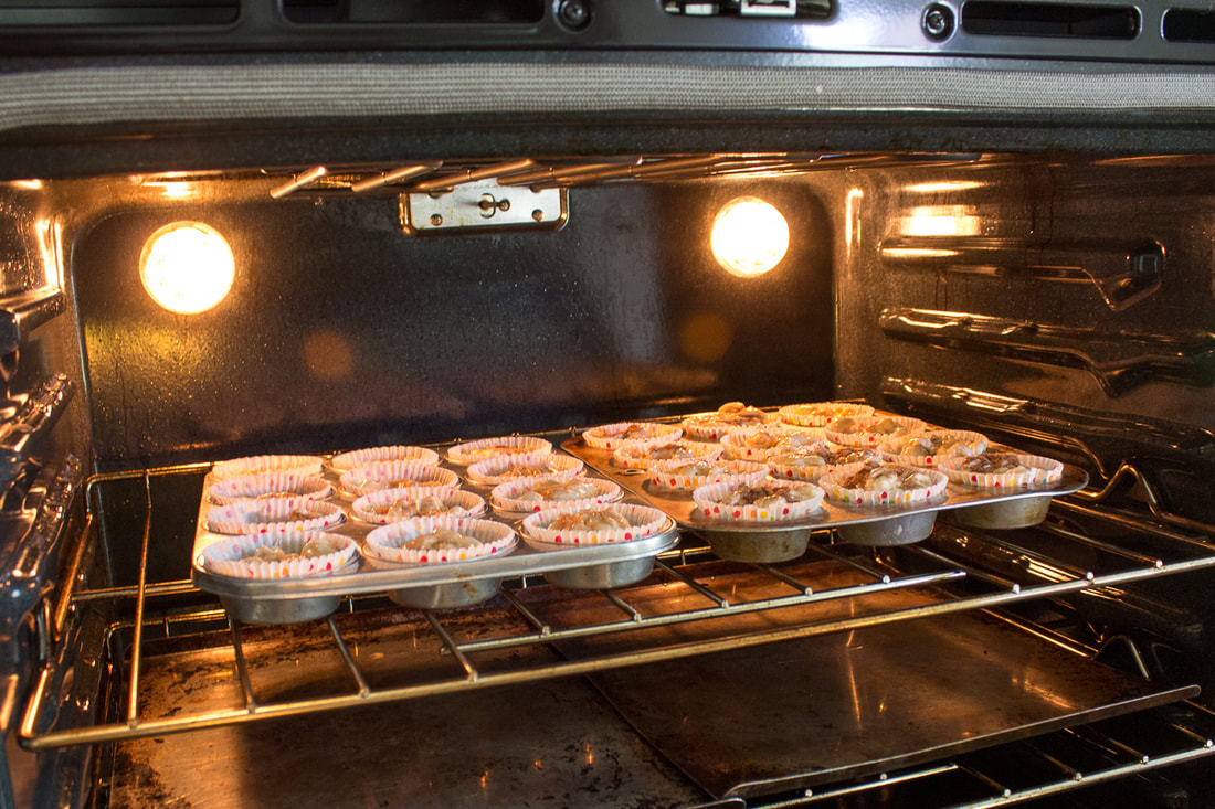 Muffins baking in oven